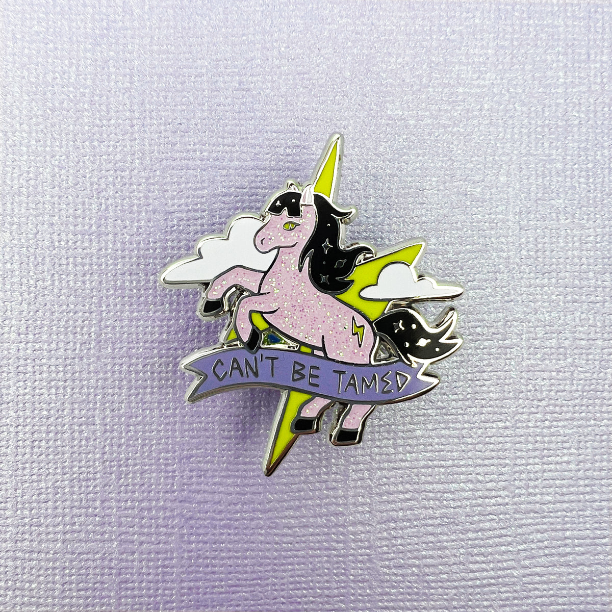 CAN'T BE TAMED // ENAMEL PIN